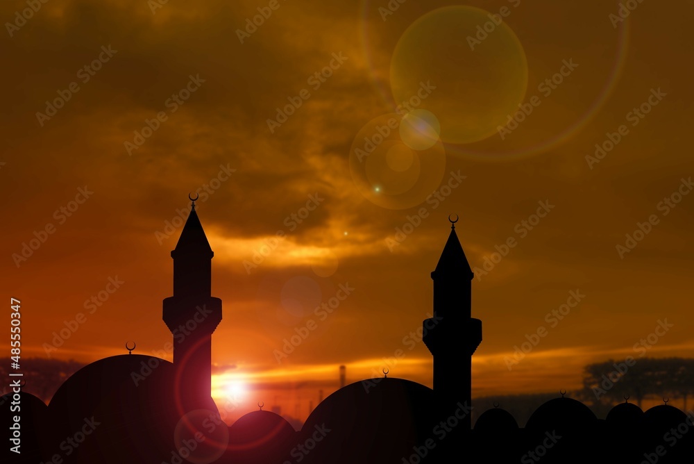 silhouette of a beautiful mosque against the background of sunset sun
