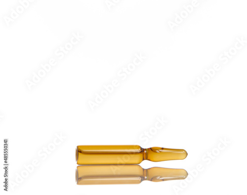 glass ampoules on white background and reflection     