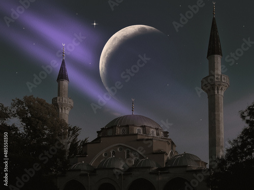Obraz na płótnie silhouette of a beautiful mosque against the background of sunset sun w salonie