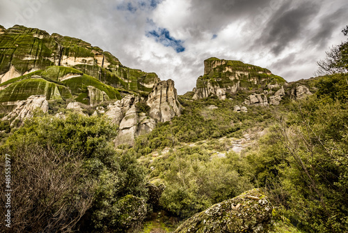 Cloudy perspective of the mighty beautiful cliffs at Meteora, Greece