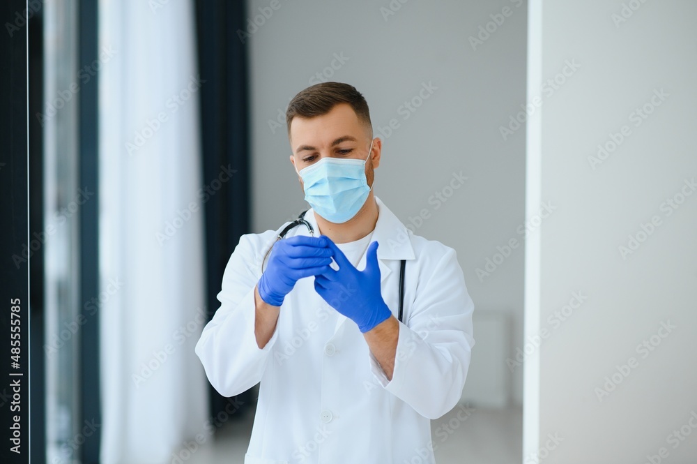 Portrait of male doctor wearing surgical mask is ready to help patients with coronavirus or covid virus. Portrait of male doctor wearing surgical mask is ready to help patients with coronavirus or covid virus.