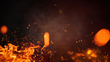 Fire embers particles over black background. Fire sparks background. Abstract dark glitter fire particles lights.