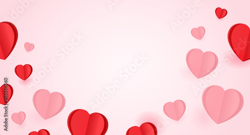 Background for card Valentines day. Red paper hearts on pink backdrop with empty place for text.