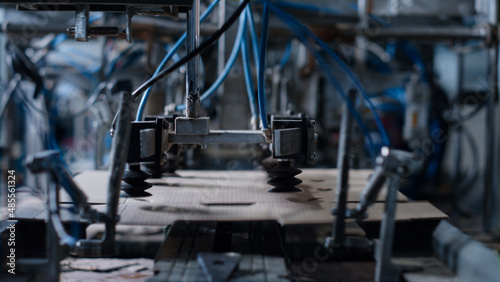 Closeup manufacture packing automat working at technological modern facility