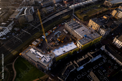 Aerial of Ubuntuplein construction site in urban development of real estate investment project in new Noorderhaven neighbourhood. Housing shortage and engineering concept.
