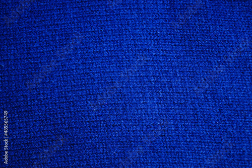 Close the background texture of blue Italian knitted wool.