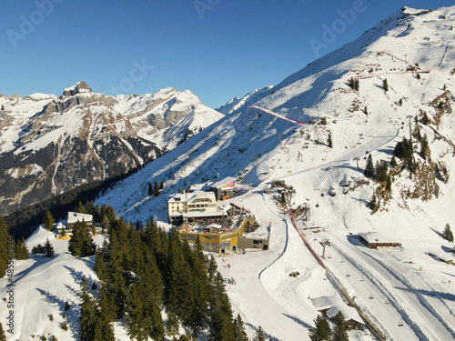 Drone view at Truebsee station over Engelberg in the Swiss alps © fotoember