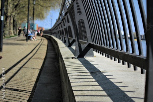 Wall Mural Pedestrian walkway with railing, running diagonally from bottom- left to centre
