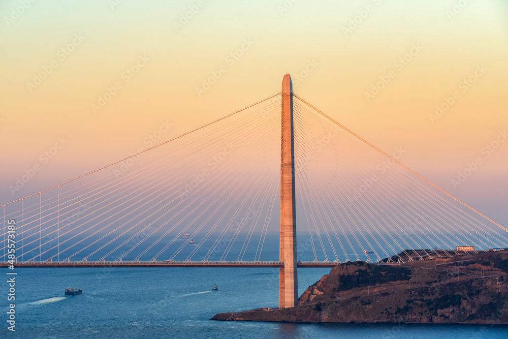 Obraz premium View of Yavuz Sultan Selim Bridge at sunset. It is named the Third Bosphorus Bridge in Istanbul, Turkey.