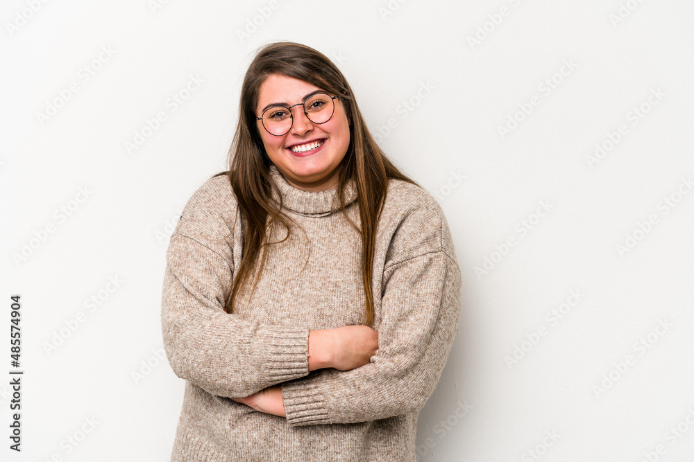 Young caucasian overweight woman isolated on white background laughing and having fun.