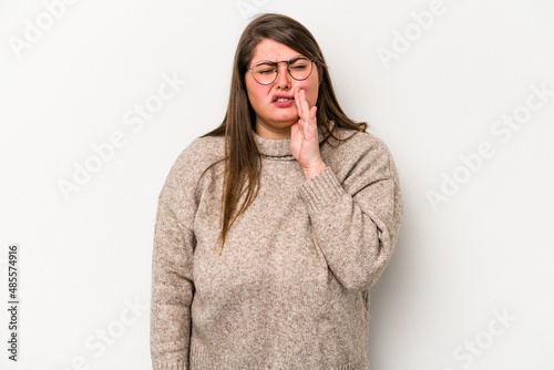 Young caucasian overweight woman isolated on white background having a strong teeth pain, molar ache. © Asier