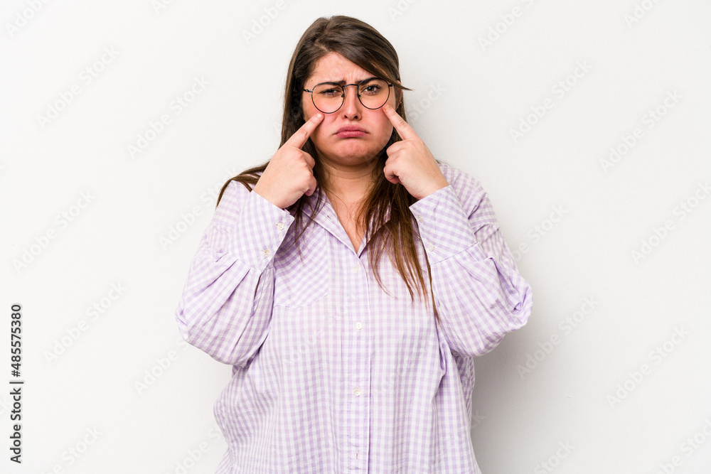 Young caucasian overweight woman isolated on white background crying, unhappy with something, agony and confusion concept. Young caucasian overweight woman isolated on white background crying, unhappy with something, agony and confusion concept.