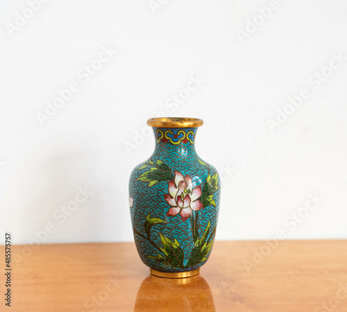 Vintage Chinese enameled copper vase with flower pattern