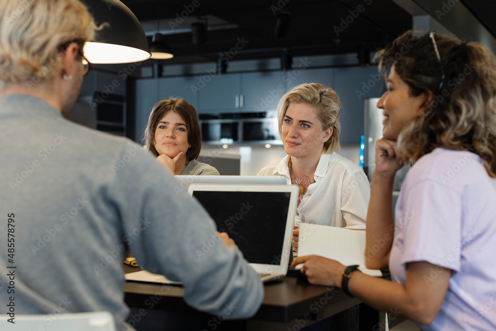 Business people having meeting in conference room Business people having meeting in conference room