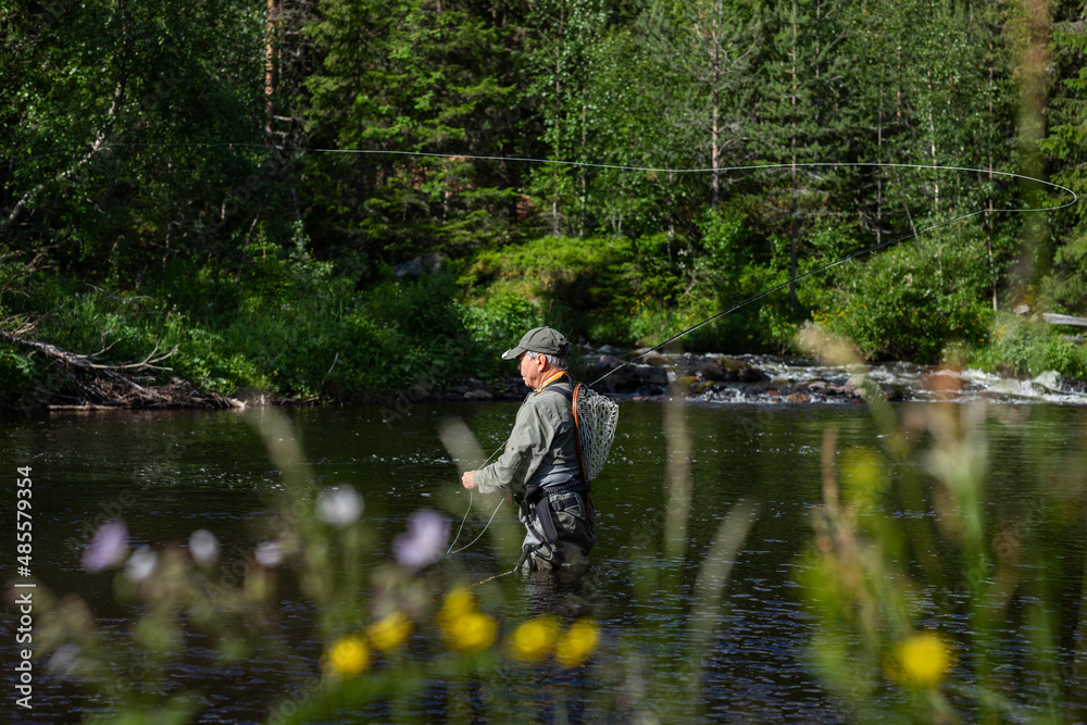 Man fishing in river Man fishing in river