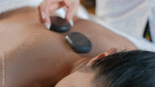 Hot stone therapy for spine at spa