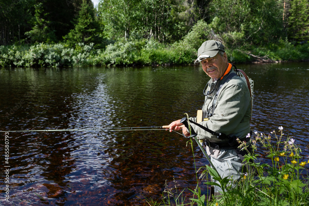 Man fishing in river Man fishing in river