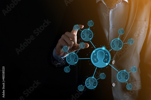 Businessman holding on hand icon of user man,woman low poly polygon style. Internet icons interface foreground. global network media concept.