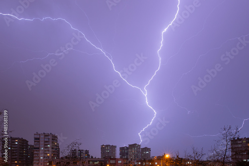 Thunder and Lightning over the city at night sky