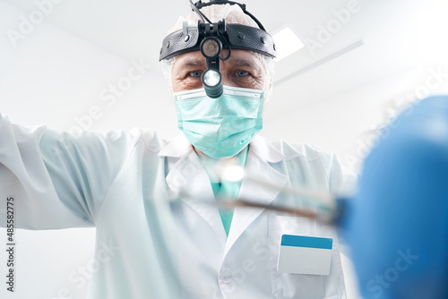 Close-up photo of otorhinolaryngologist at work process