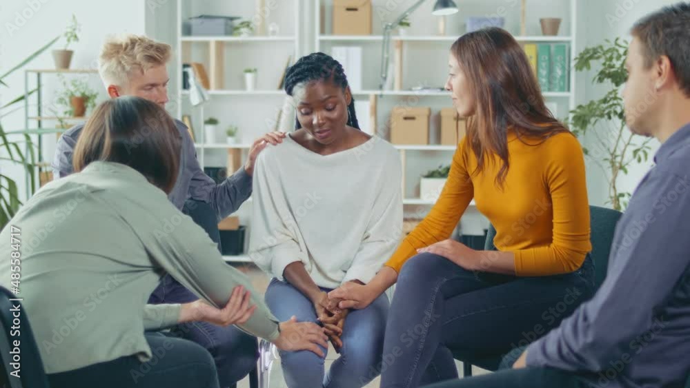 African American Woman Shares Her Personal Addiction Problem, Emotional Pain, Receives Psychological Support, Compassion, Empathy From People in a Group Therapy Session. Abuse, Violence, Depression. African American Woman Shares Her Personal Addiction Problem, Emotional Pain, Receives Psychological Support, Compassion, Empathy From People in a Group Therapy Session. Abuse, Violence, Depression.