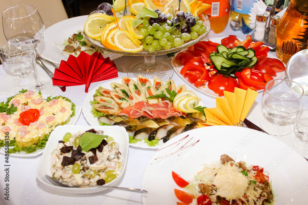 Buffet table for a holiday or corporate event. A large assortment of snacks. Buffet breakfast