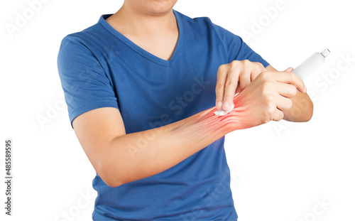 man apply painkillers to wrist