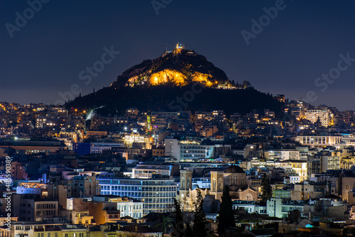Greece Athens at night, view of Lycabettus hill, cityscape,