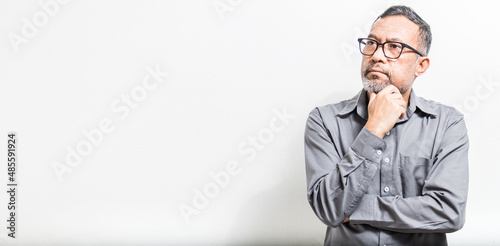 Businessmen contemplating marketing, finance, and banking plans to make investment decisions in real estate, automotive, and technology businesses. which is risky and will get high profits. Copy space