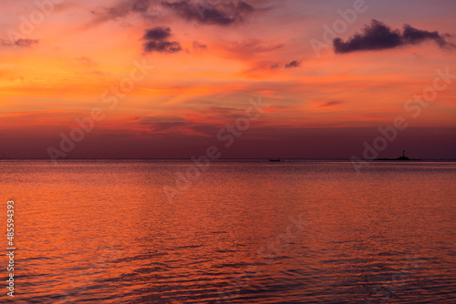Beautiful sunset over the sea water on the island of Koh Phangan, Thailand. Travel and nature concept © OlegD