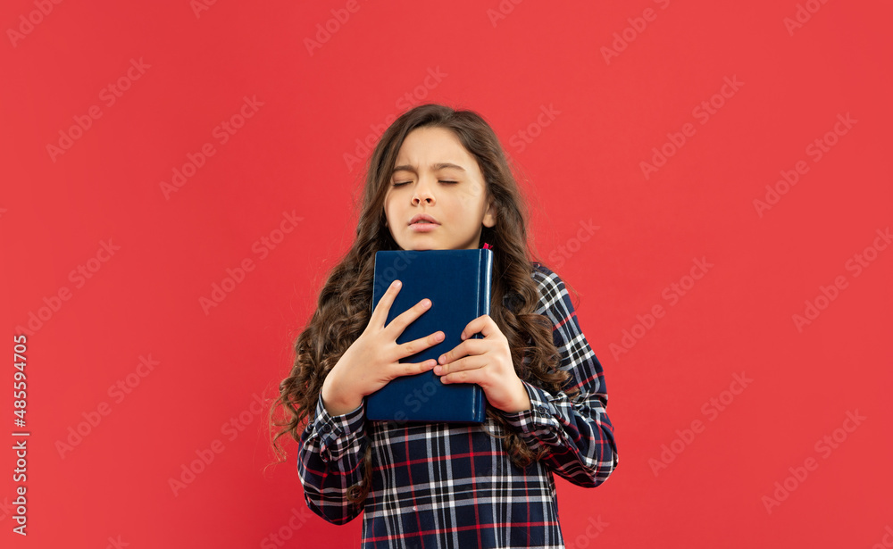 sleepy child hold book on red background, study sleepy child hold book on red background, study