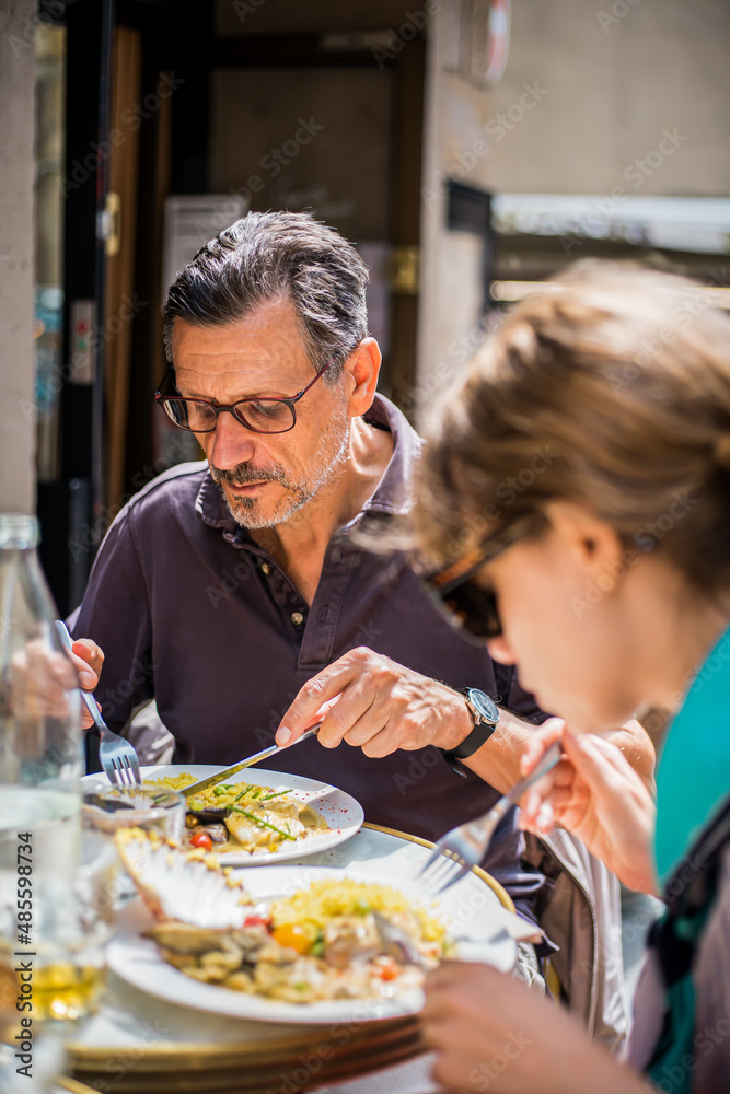 Couple having lunch on terrace of restaurant Couple having lunch on terrace of restaurant