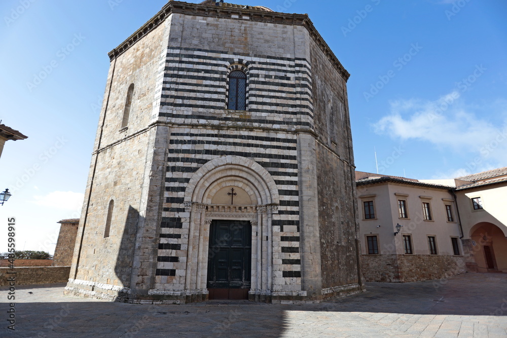 The Baptistery of San Giovanni in the historic center of Volterra, in front of the Duomo, Diocese of Volterra in Tuscany, Italy.