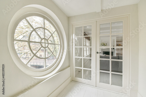 Interior of corridor with round window photo