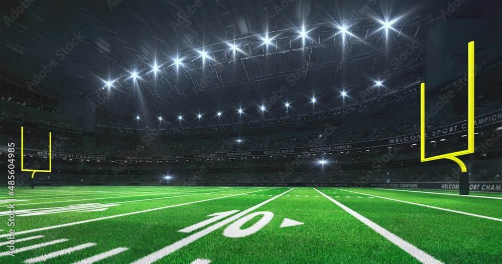  American football stadium with yellow goalposts, grass field and glowing spotlights and camera flashes. Sport advertisement 4K video loop.