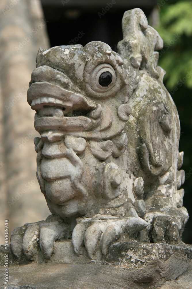statue of a lion (?) in a temple (one pillar pagoda) in hanoi (vietnam)