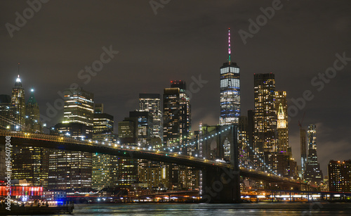 Wallpaper Mural Brooklyn Bridge under the full moon night landscape. This amazing constructions is one of the most known landmarks in New York. Torontodigital.ca