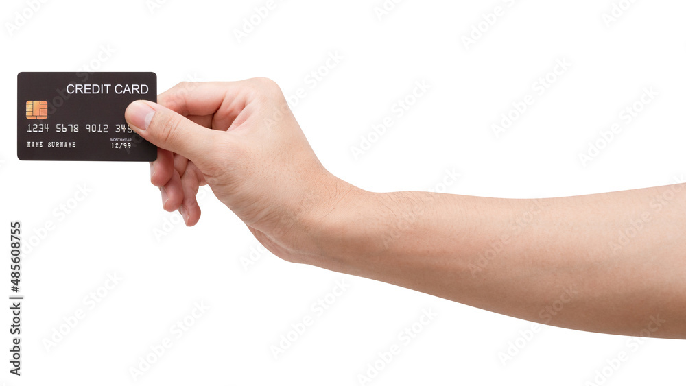 The woman's hand holds a black credit card isolated on white background. The woman's hand holds a black credit card isolated on white background.