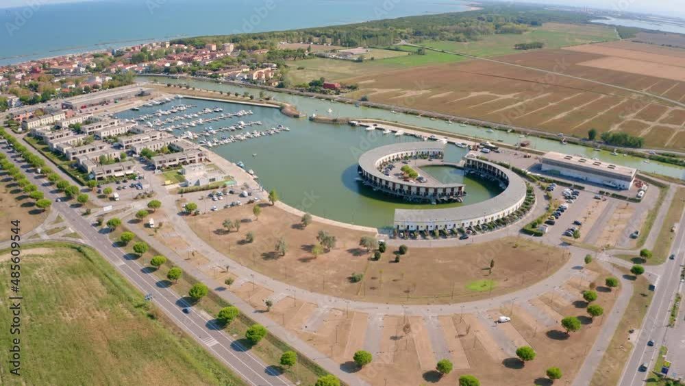 4k drone forward video (Ultra High Definition) of Casal Borsetti port. View from flying drone of Adriatic sea, Italy, Europe. Traveling concept background..