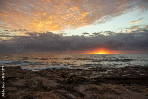 Morning sunrise view of ocean at Orange rocks in Uvongo, East coast of South Africa 