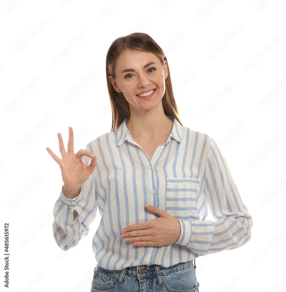 Healthy woman holding hand on belly and showing OK gesture against white background Healthy woman holding hand on belly and showing OK gesture against white background