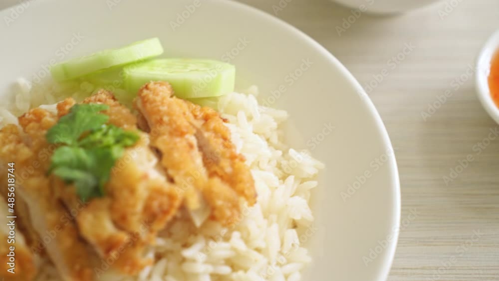 Steamed Rice with Fried Chicken or Hainanese Chicken Rice - Asian food style Steamed Rice with Fried Chicken or Hainanese Chicken Rice - Asian food style