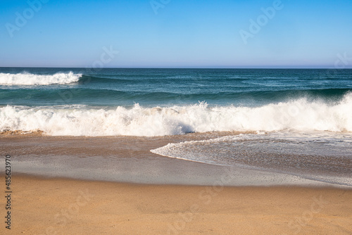 Sticker waves crashing on California shoreline