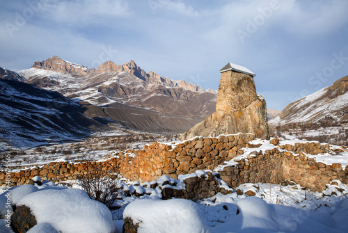 Ancient towers of Upper Balkaria in the winter in the snow