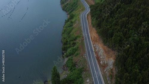 Rainy roads between mountains and lakes.