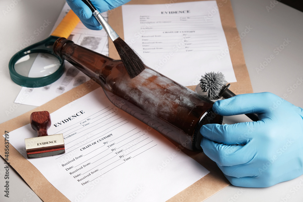 Forensic fingerprint analysis, criminalist collects latent fingerprints ...