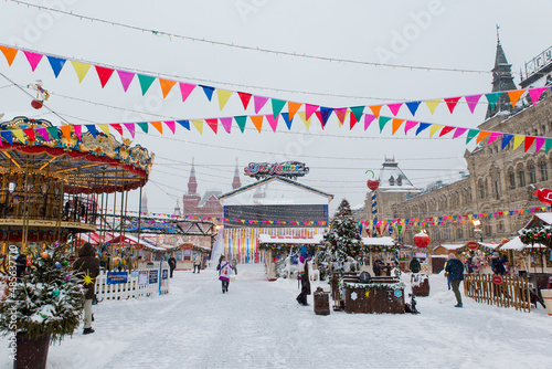 Moscow, Russia, February 7, 2022, winter fair on Red Square in the morning. View of the ice rink and Channel 1 TV 