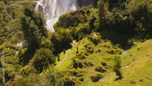 Trekking in forest and waterfall in Patagonia, Chile.