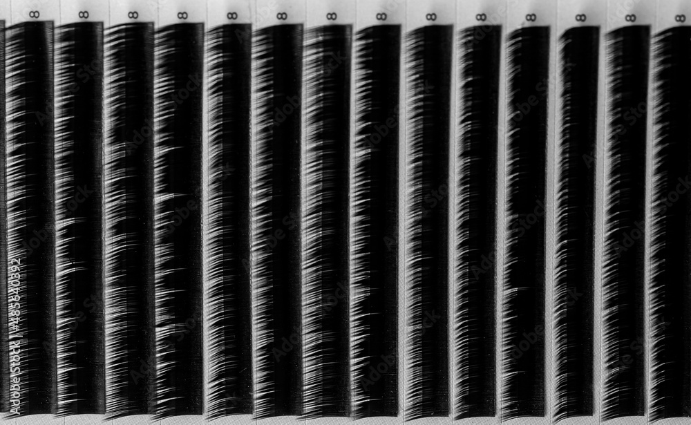 Set black lashes white isolated background top view, eyelash extension concept Set black lashes white isolated background top view, eyelash extension concept