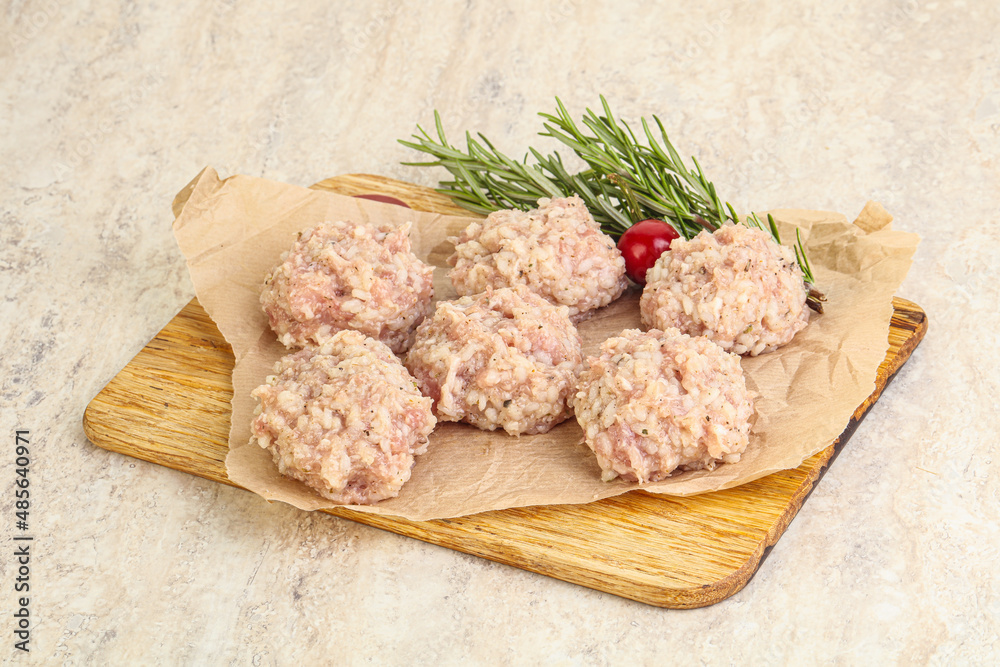 Traditional homemade raw pork meatballs Traditional homemade raw pork meatballs